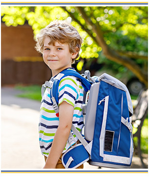 Student with backpack outside